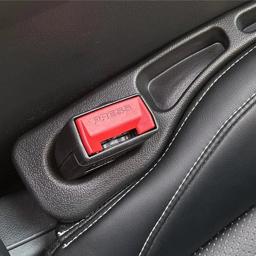 Seat gap filler storage slots