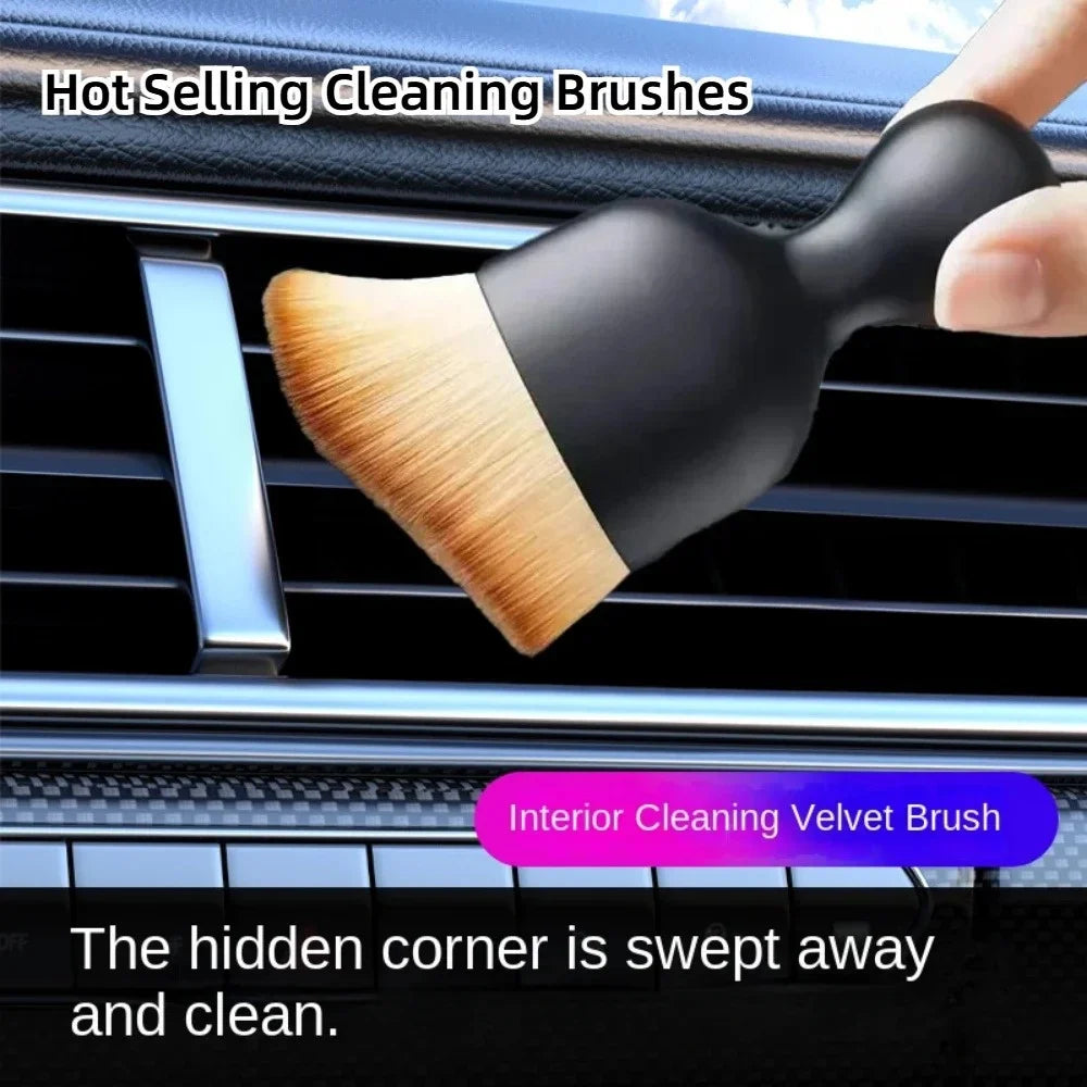Cleaning car air vent with soft brush